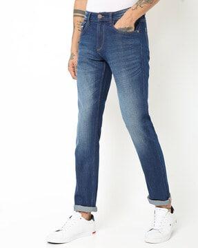 mid-wash skinny fit jeans