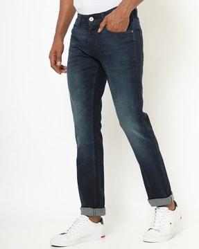 mid-wash skinny fit jeans