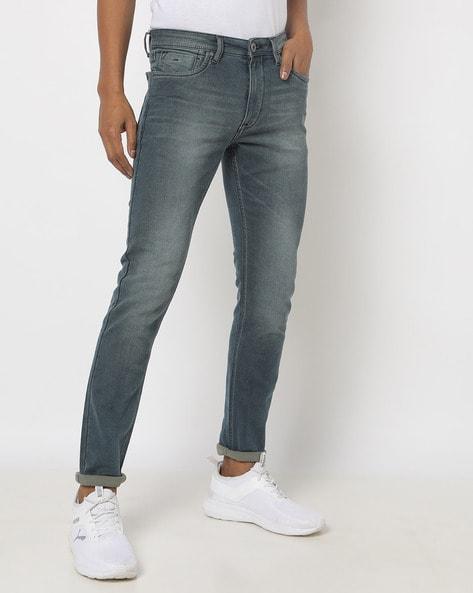 mid-wash skinny fit jeans