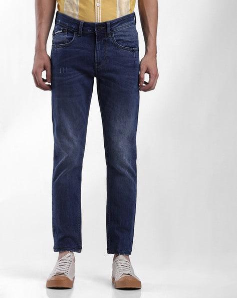 mid-wash skinny fit jeans