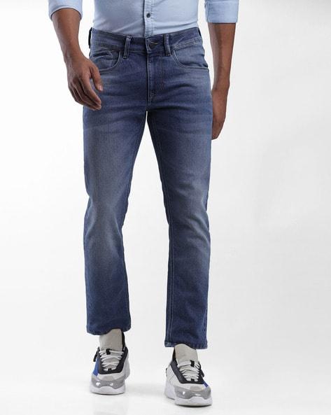 mid-wash skinny fit jeans