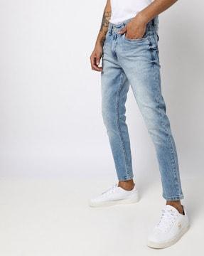 mid-wash skinny fit jeans