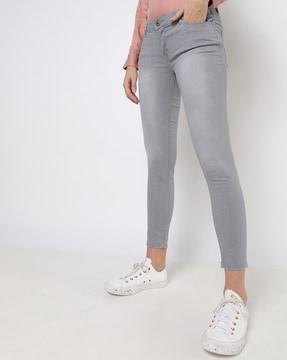 mid-wash skinny fit jeans