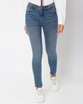 mid-wash skinny fit jeans