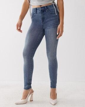 mid-wash skinny fit jeans