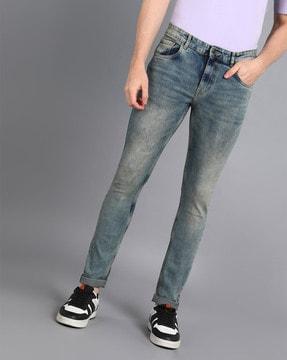 mid-wash skinny fit jeans