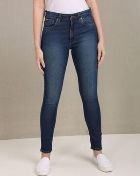 mid-wash skinny fit jeans