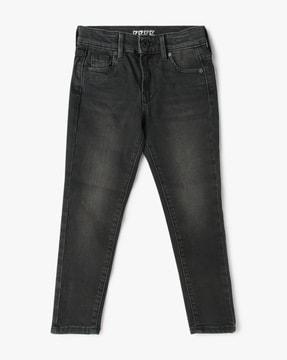 mid-wash skinny fit jeans