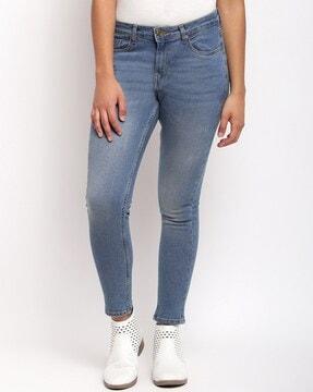 mid-wash skinny fit jeans