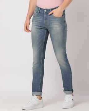 mid-wash skinny fit jeans