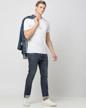 mid-wash skinny fit jeans