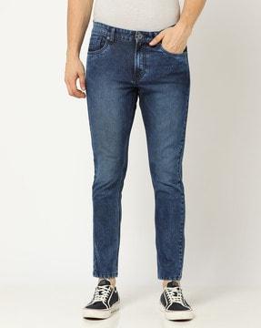 mid-wash skinny fit jeans