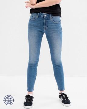 mid-wash skinny fit jeans