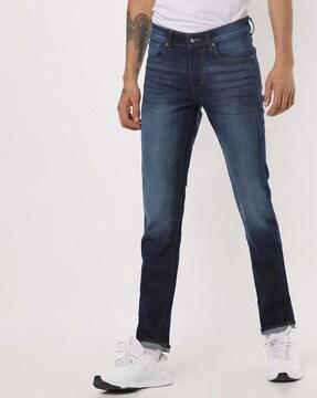 mid-wash skinny fit jeans