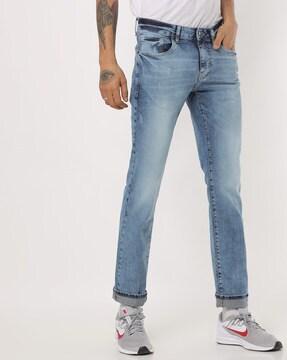 mid-wash skinny fit jeans