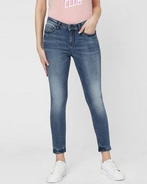 mid-wash skinny jeans with 5-pocket styling