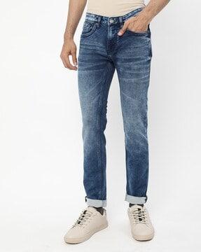 mid-wash skinny jeans