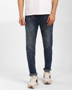 mid-wash slim fit jeans with button closure