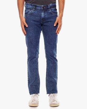 mid-wash slim fit jeans with button closure