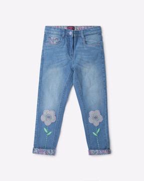 mid-wash slim fit jeans with floral applique