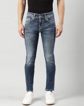 mid-wash slim fit jeans