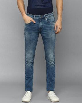 mid-wash slim jeans with insert pockets