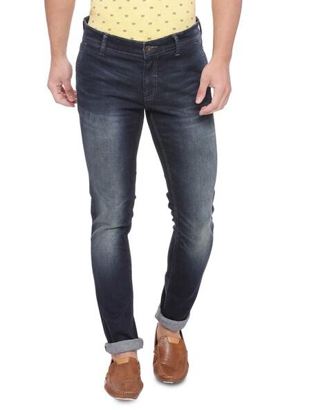 mid wash slim jeans