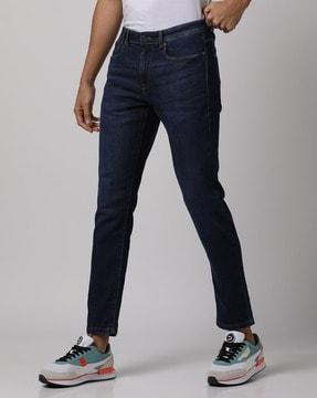 mid-wash slim tapered fit jeans