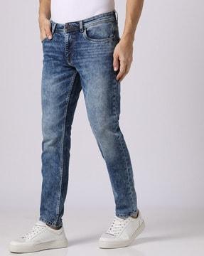 mid-wash slim tapered fit jeans