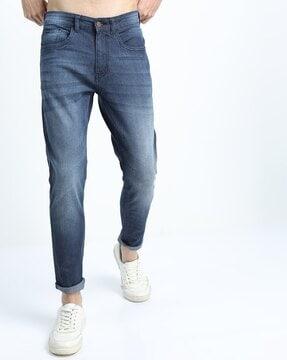 mid-wash tapered fit jeans