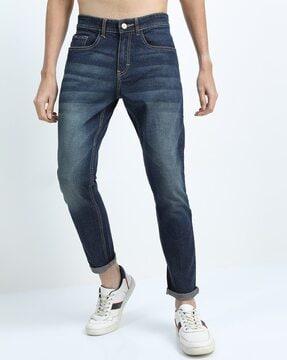 mid-wash tapered fit jeans