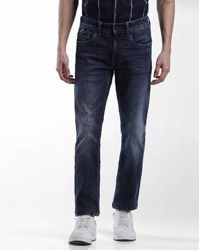 mid-wash tapered fit jeans