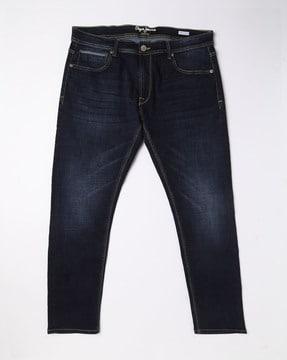 mid-wash tapered fit jeans