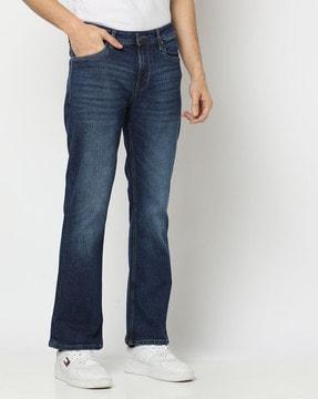 mid-wash tapered fit whiskered jeans