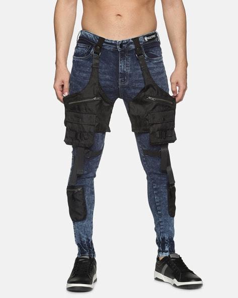 mid-wash tapered jeans with zip pockets