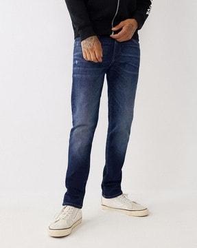 mid washed straight jeans with insert pockets
