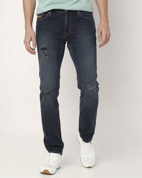 mikasa mid-wash ripped slim fit jeans