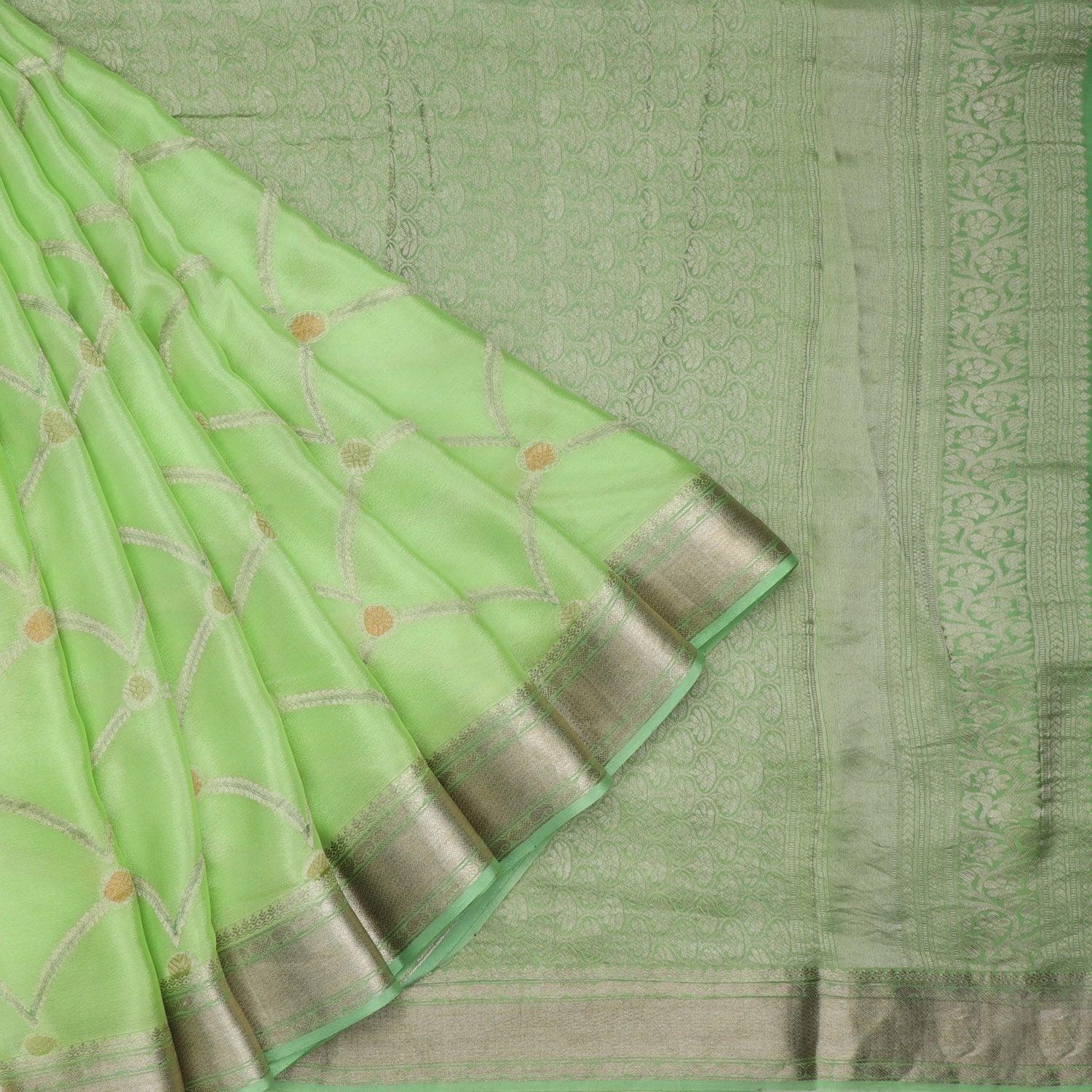 mint green banarasi silk saree with floral pattern