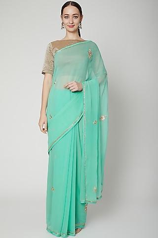 mint green embroidered saree