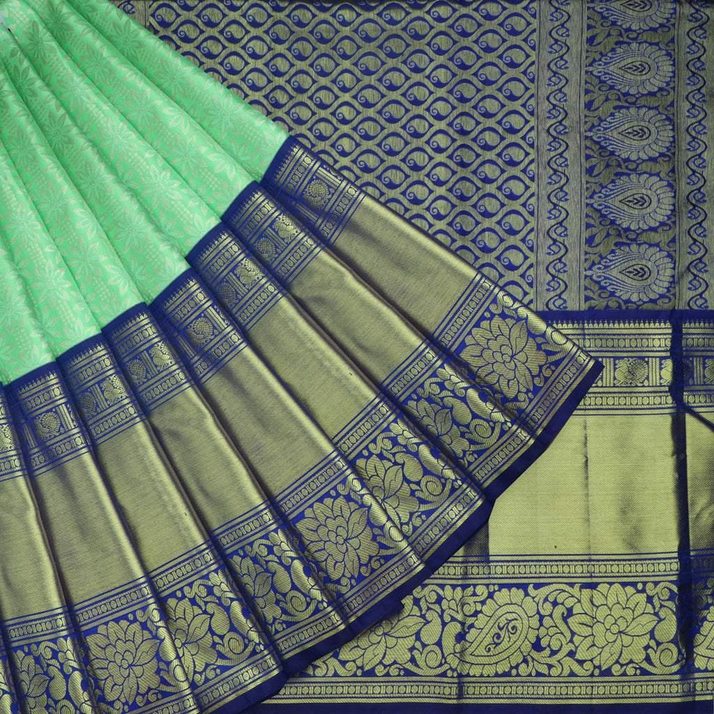 mint green kanjivaram silk saree with floral motifs