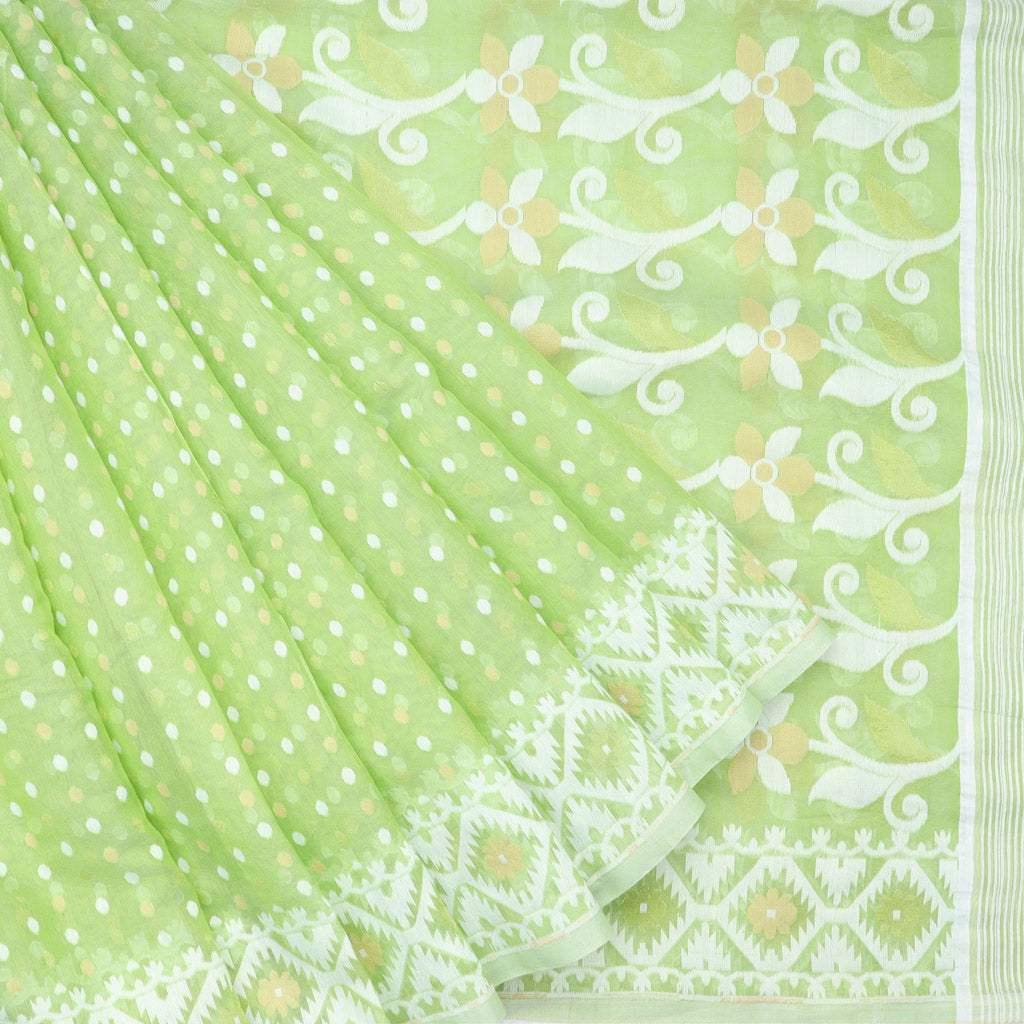 mint green soft net saree with polka dotted pattern