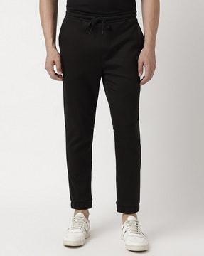 mirror-effect logo relaxed-fit tracksuit bottoms