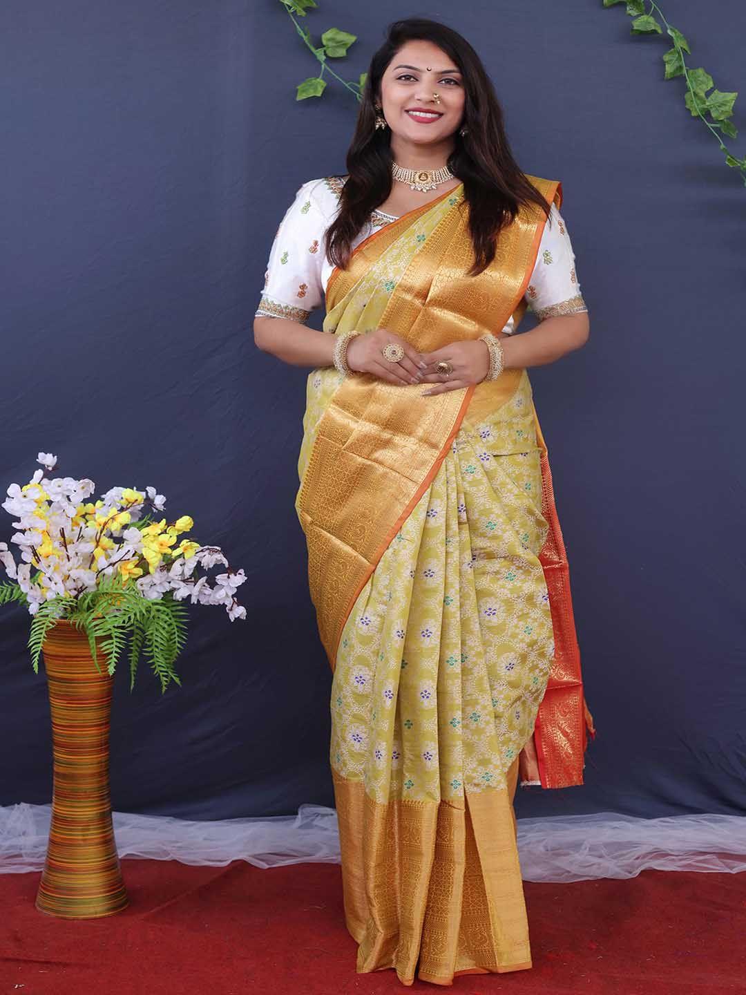 mitera yellow & gold-toned ethnic motif printed zari saree