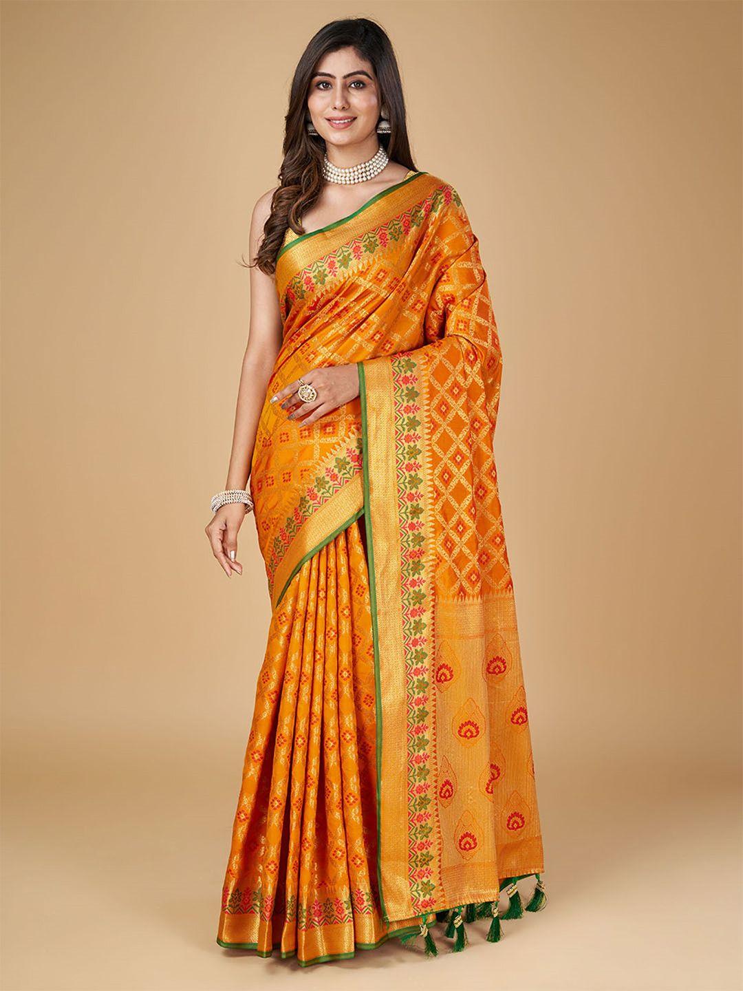 mitera woven design zari silk blend designer patola saree with tassels