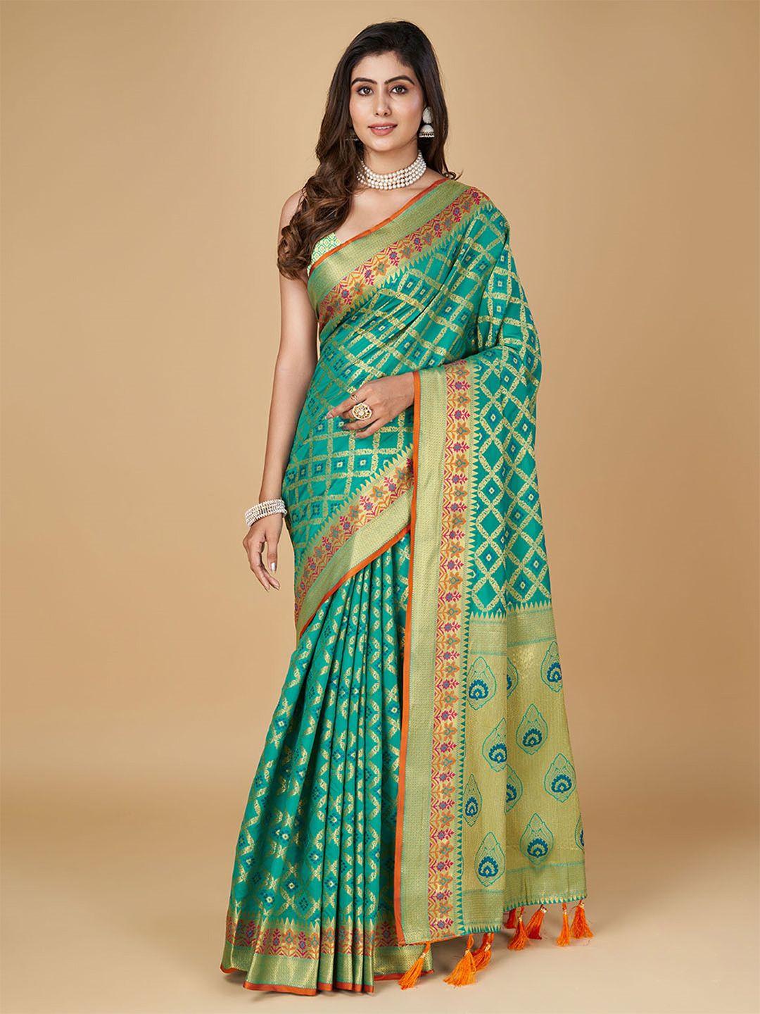 mitera woven design zari silk blend designer patola saree with tassels