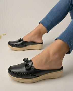 moccasins with bow accent