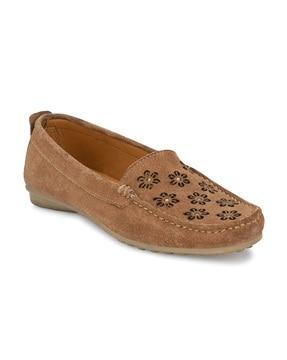 moccasins with floral cutouts