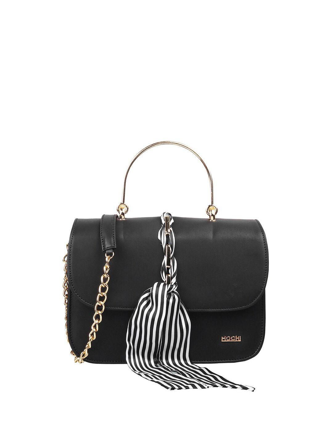 mochi black textured purse clutch