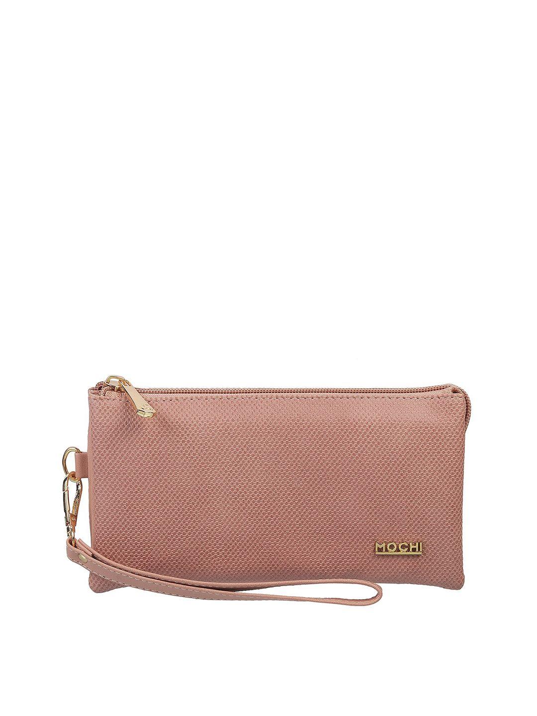 mochi peach-coloured purse clutch