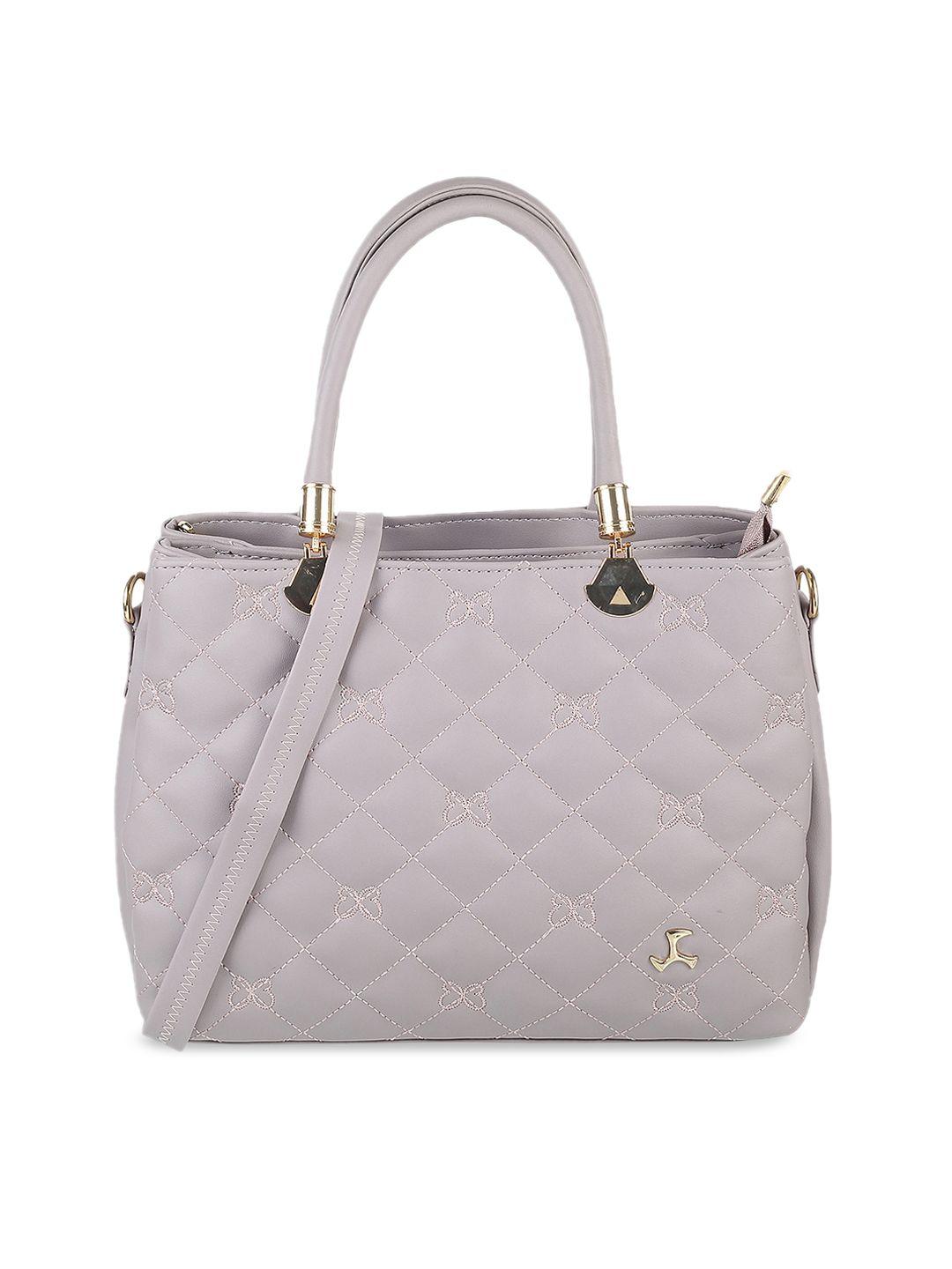 mochi textured structured handheld bag with quilted